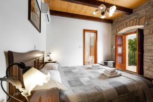 Posteľ alebo postele v izbe v ubytovaní Villa Stauri