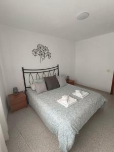 Postel nebo postele na pokoji v ubytování Cheyma Home 2ºA, Luminoso apartamento en Alcalá
