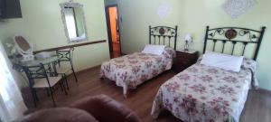 Posteľ alebo postele v izbe v ubytovaní Casa Rural Os Carballos