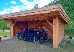 a group of bikes parked in a garage at Nordnes Kro og Camping in Rokland