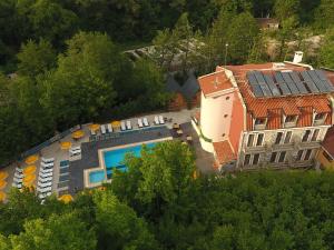 an aerial view of a building with a swimming pool at Butterfly Butik Hotel in Kırklareli