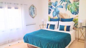 Posteľ alebo postele v izbe v ubytovaní Maison avec Jacuzzi et terrasse sur les toits