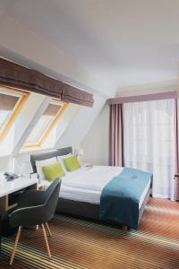 Postel nebo postele na pokoji v ubytování Stay inn Hotel Gdańsk