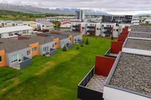 an aerial view of a city with houses at Family apartment hosted by LL in Akureyri