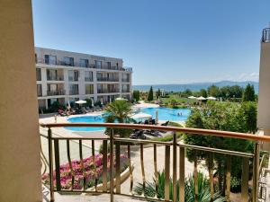 a view of a pool from a balcony of a hotel at Diamond Beach Sarafovo by KP - Luxury Collection, Apt 5 in Burgas