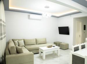 Posezení v ubytování Mourati House