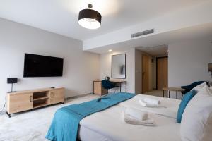 Posteľ alebo postele v izbe v ubytovaní Hotel Jarzębata + 37 fotografií