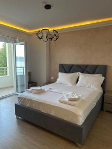 Postel nebo postele na pokoji v ubytování Hotel DEMOLI