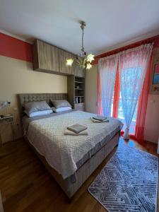 Postel nebo postele na pokoji v ubytování Rainbow Floor
