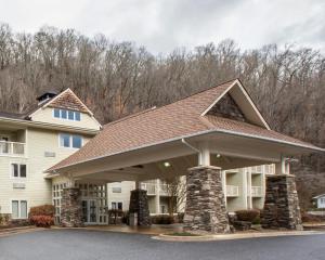 a large building with a large gazebo at Super 8 by Wyndham Cherokee in Cherokee +12 photos