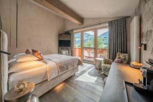 Postel nebo postele na pokoji v ubytování Hotel Post