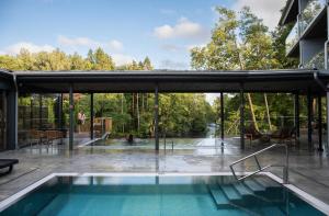 Bazén v ubytování Hestraviken Hotell & Spa nebo v jeho okolí