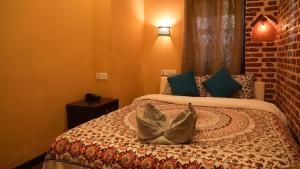 Letto o letti in una camera di Hong Si Hotel- A Home Away from Home