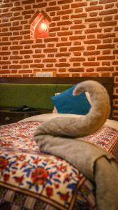 Letto o letti in una camera di Hong Si Hotel- A Home Away from Home