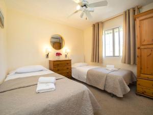 Łóżko lub łóżka w pokoju w obiekcie Holiday Home Bergen by Interhome
