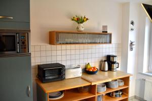 Küche/Küchenzeile in der Unterkunft Ferienhaus Fiete 2