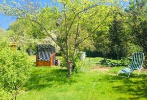 Ein Garten an der Unterkunft Ferienhaus Fiete 2