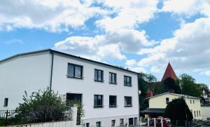 Das Gebäude in dem sich das Ferienhaus befindet
