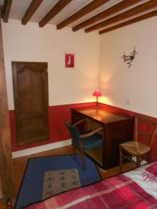 Ένα ή περισσότερα κρεβάτια σε δωμάτιο στο Chez Christophe