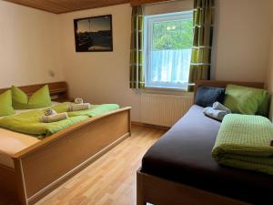 Łóżko lub łóżka w pokoju w obiekcie Apartment Helga-2 by Interhome