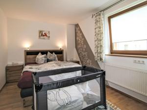 Posteľ alebo postele v izbe v ubytovaní Apartment Brettfall Blick by Interhome