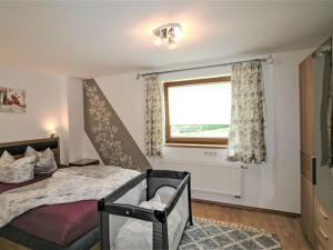 Posteľ alebo postele v izbe v ubytovaní Apartment Brettfall Blick by Interhome