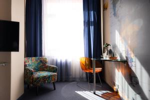 A television and/or entertainment centre at Hotel Liberec