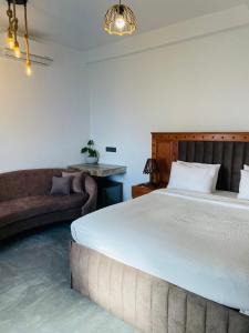 Postel nebo postele na pokoji v ubytování Cozy Homestay