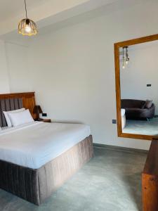Postel nebo postele na pokoji v ubytování Cozy Homestay