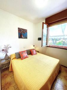 Postel nebo postele na pokoji v ubytování Condominio Splendid