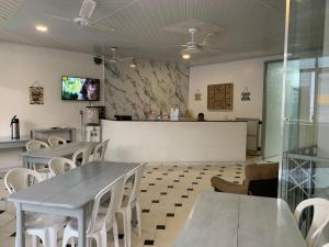 Μια τηλεόραση ή/και κέντρο ψυχαγωγίας στο Hotel Central Abaetetuba