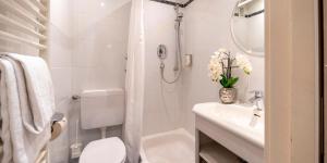 Ванна кімната в PLAZA INN Rieker Stuttgart Hauptbahnhof