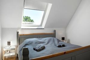 Postel nebo postele na pokoji v ubytování Ferienwohnung Ostwind