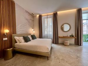 Postel nebo postele na pokoji v ubytování Elegant Rooms