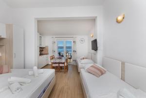 Postel nebo postele na pokoji v ubytování Apartments Ljiljana