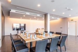 Telewizja i/lub zestaw kina domowego w obiekcie Hotel Barú