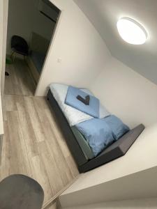 Posteľ alebo postele v izbe v ubytovaní Türkiz Apartman Siófok