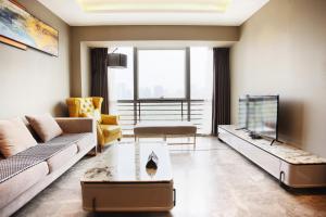 Posezení v ubytování Yashi International Aparthotel