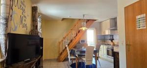 Kuchyň nebo kuchyňský kout v ubytování Ferienwohnung S41 "Malta Zehn - Lebensfreude" + 2 fotografie