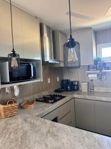 Foto sihtkohas Aquiraz asuva majutusasutuse Cobertura exclusiva duplex com vista incrível da praia de Porto das Dunas galeriist