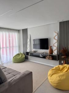 Foto sihtkohas Aquiraz asuva majutusasutuse Cobertura exclusiva duplex com vista incrível da praia de Porto das Dunas galeriist