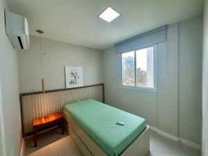 Ένα ή περισσότερα κρεβάτια σε δωμάτιο στο Cobertura exclusiva duplex com vista incrível da praia de Porto das Dunas +37 φωτογραφίες