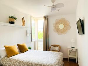 Postel nebo postele na pokoji v ubytování Habitación céntrica con Aire Acondicionado Baño privado Nevera