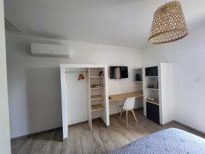 Postel nebo postele na pokoji v ubytování Gîte Le Ka-Marrant 4 Etoiles - LES PUJOLS - ARIEGE