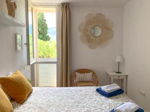 Postel nebo postele na pokoji v ubytování Habitación céntrica con Aire Acondicionado Baño privado Nevera