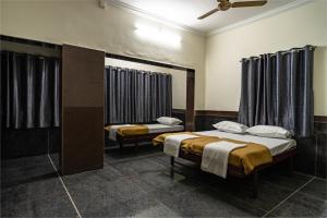 Fotografie z fotogalerie ubytování RajGaurav Lodging v destinaci Kolhápur