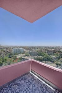 a balcony with a view of a city at VESTA Nile View Residence - Maadi in Cairo