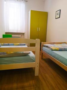 Postel nebo postele na pokoji v ubytování Chillax Rooms