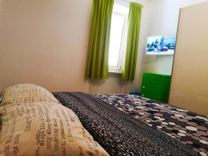 Postel nebo postele na pokoji v ubytování Chillax Rooms