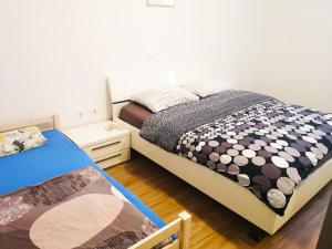 Postel nebo postele na pokoji v ubytování Chillax Rooms